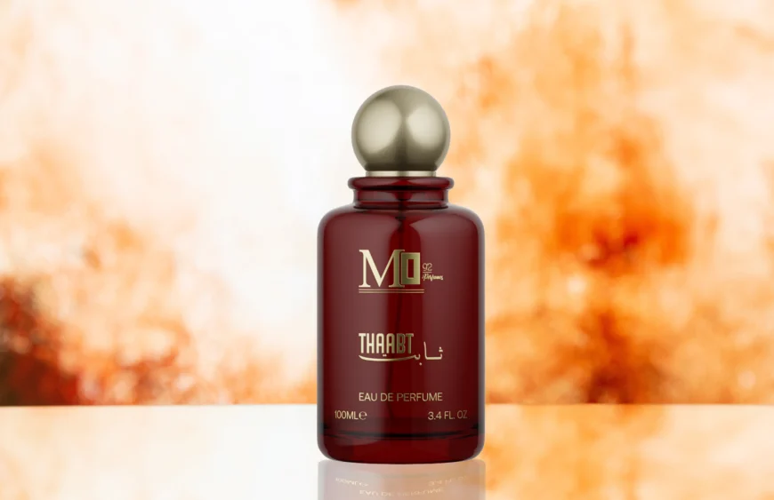 front-view-perfume-bottle-biege-blurred-background